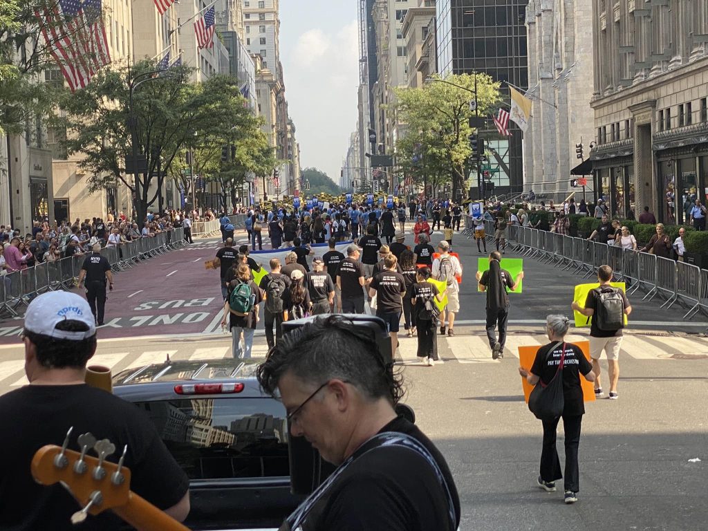 Sarah marching with NYCB