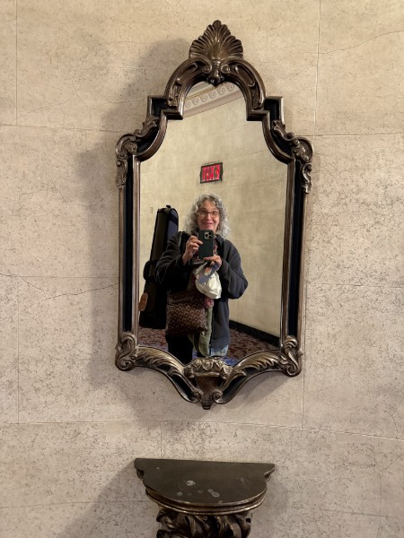 Sarah in a mirror